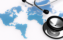 Stethoscope over a world map